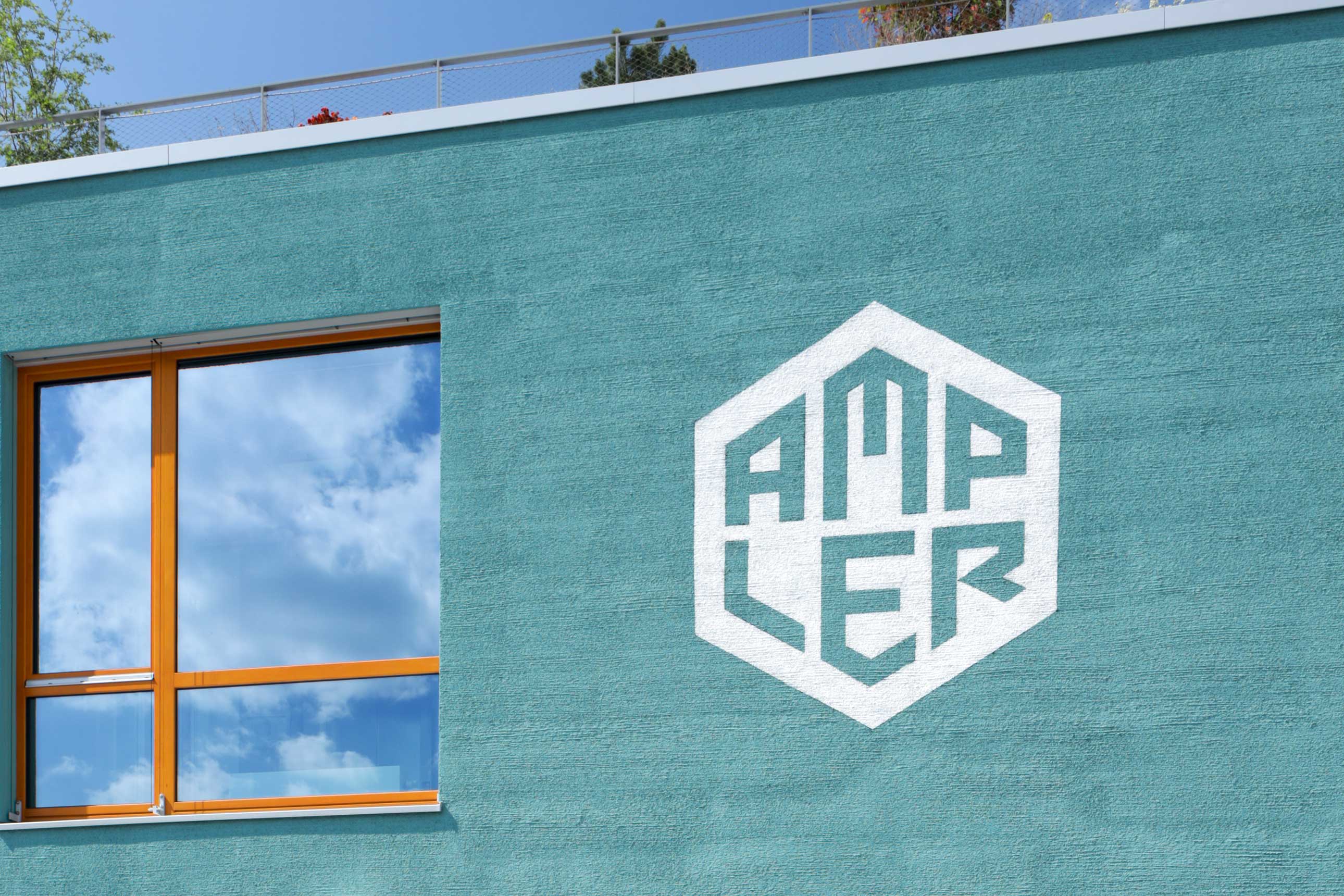 Ampler Berlin-Schoeneberg - Schriftgestaltung, Aussenfassadegestaltung, Logo - Graupalette